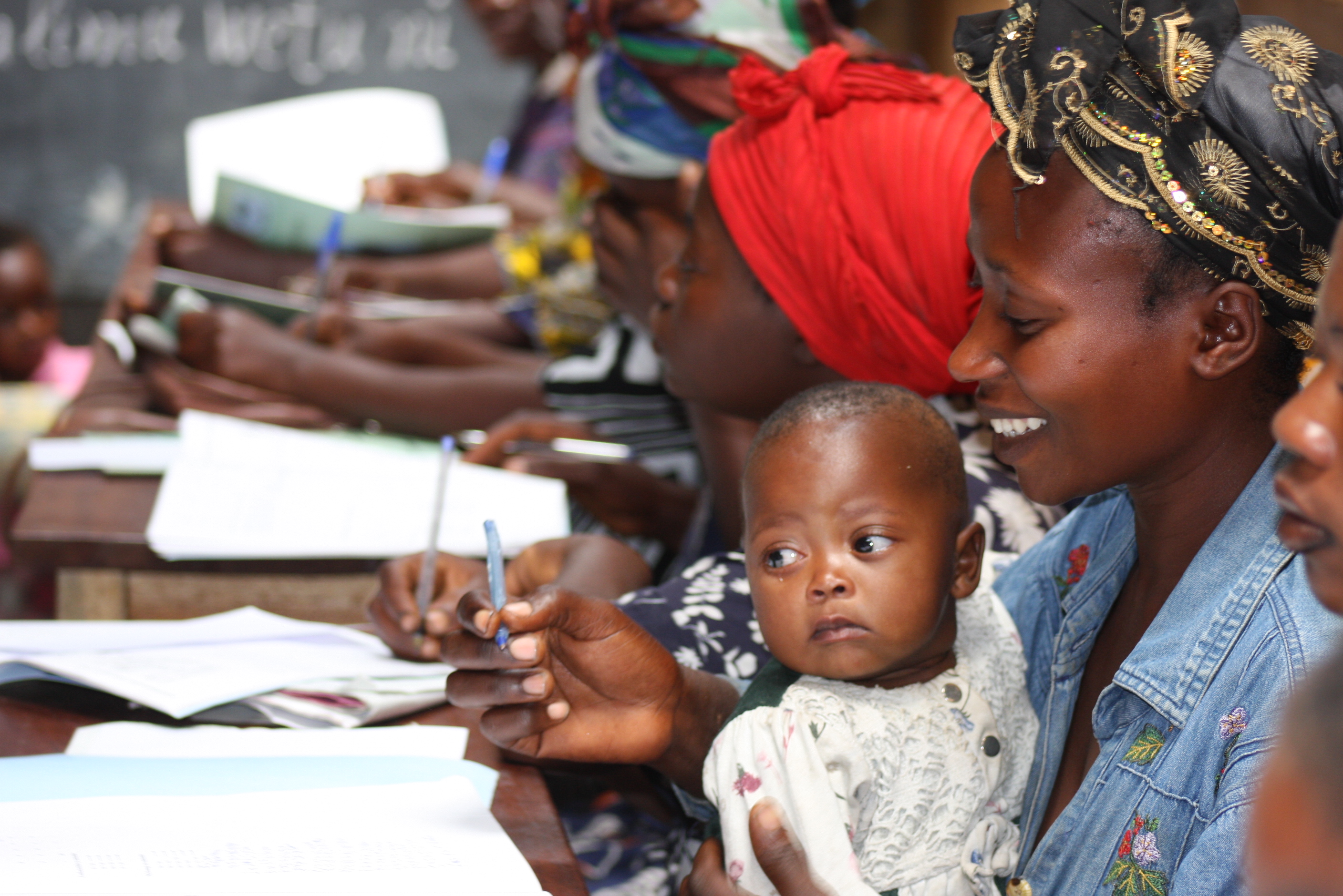 A WfW-Rwanda participant with her child